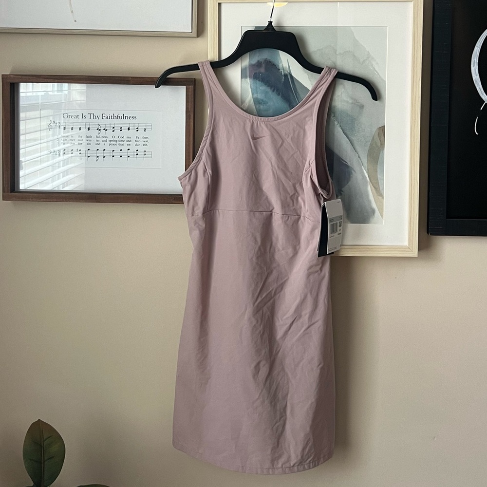 Nike light mauve tennis dress. Size XS. NWT